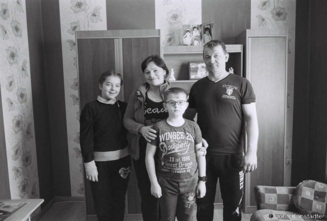 12b.Portraits of Polesia, Aljaksandr and Natasha (Teacher in Azdamichy) with Their Two Children,  Blessing of Houses on Vadokhryshcha, Azdamichy 2019, 2019007_35A