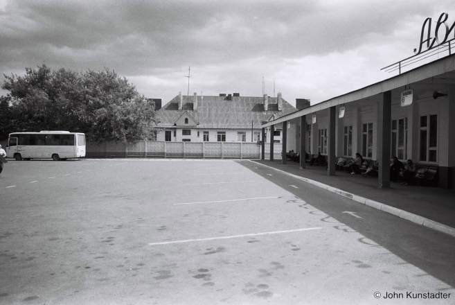 View-through-bus-station-to-Polish-era-railroad-workers'-housing-Stoubtsy-2017
