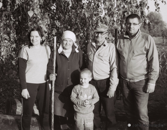 16.Granddad-Vasil-and-His-Wife-Vjera-with-Their-Son-Vasil-Vasils-Wife-Volha-and-in-front-Their-Grandson-Jelijsjej-Son-of-Their-Other-Son-Ivan-Tsjerablichy-2018-2018260a_32A2