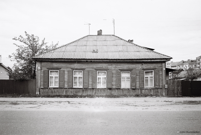Older-Wooden-House-with-Traditional-Decorative-Wooden-Window-Frames-lishtvy-Chervjen-Ihumjen-2015-2015356-0