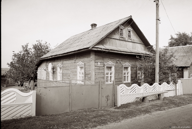 3.Traditional-House-with-Moustache-Motif-Decorative-Window-Frames-Juravichy-2015-2015360-20A
