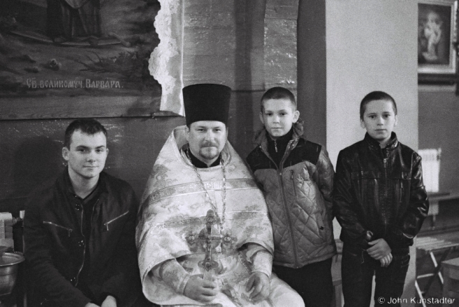 4f.Father Aljaksandr with Two of His Sons and a Third Acolyte after the All-Night Easter Service, Azdamichy 2015, 2015090-36A