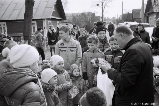 5.Father Jan Distributing Easter Candy after Mass, Haliushchyzna 2016, 2016111-6A
