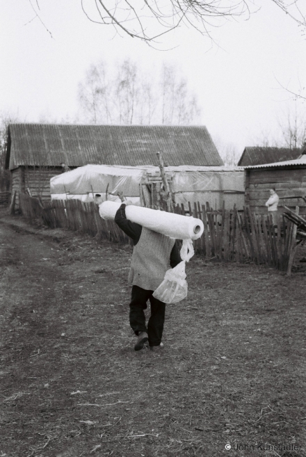 9.Carrying-Plastic-Sheeting-for-Repairing-Hothouse-Tsjerablichy-2012-2012072e-31